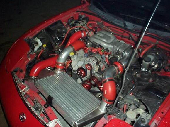 this is the current setup under the hood.  2000 turbos and motor.  spearco intercooler with stock bovs.