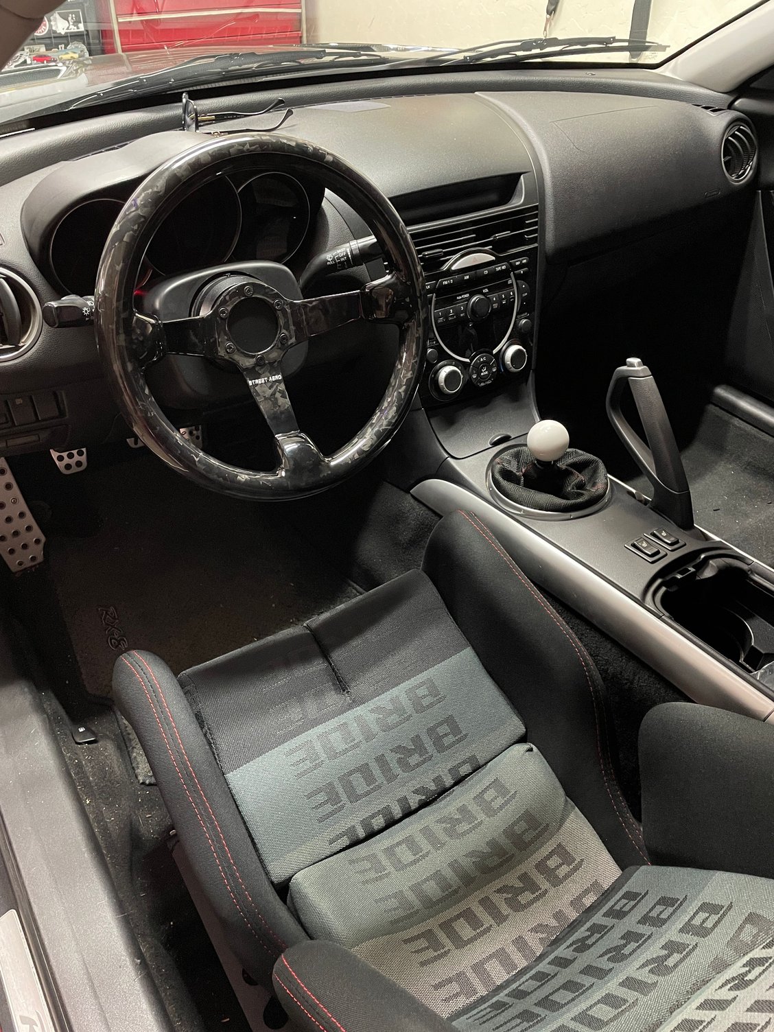 Street Aero steering wheel installed. Took quite a bit of work to get it installed properly and have no SRS/DSC lights. 