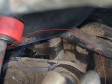 Red circle is the part i am talking about. Blue circle is what we think the problem might be it seems like there should be 4 hoses coming out from there 2 are broken im guessing. What should i do/order/fix?