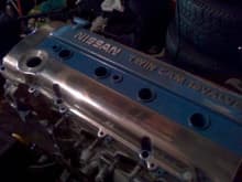 jus started on the s14 valve cover.....its addicting haha. doin t-stat housing now. finished fuel lines and brake lines. whats next haha