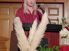 Giving her graduation speech.