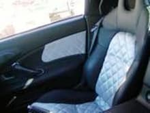 my custom upholstery with bruched aluminum vynal and diamond