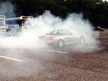 Silver S2000 roasting it's tires