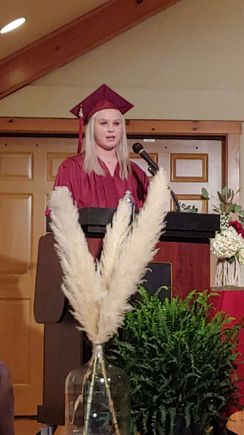 Giving her graduation speech.