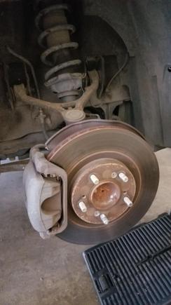 Brakes were squeaky, still had Honda rotors. The screws are one the worst things I experienced with this car. Tried an impact screw driver, heat, cold, then finally spent hours drilling ALL 8 OF THEM out. Painful. 