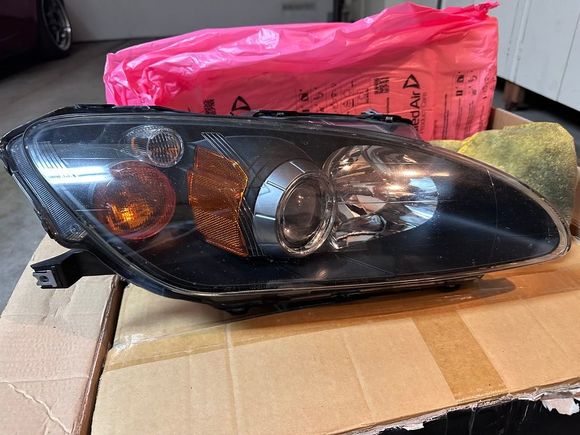 Facebook is a blessing and a curse. Saw AP2 headlights WITH bulbs and ballasts for less than $700. Dirty and they had some crazing but good enough. 