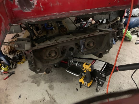 Dropped the subframe today.  This will give me better access to clean up the trunk pan mating surface.  You could do it with the subframe on but I’m swapping to an AP2 subframe anyways so it was a no brainer.