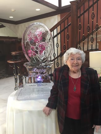 My Mother just turned 99 years old a few days before Mothers Day.  I took her along with other relatives to Brunch,  Here is a picture taken along side of the ice sculpture in the lobby.