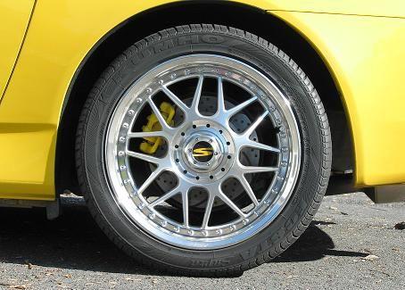 Ricks Steering Wheel Badges on Racing Hart C2s.jpg