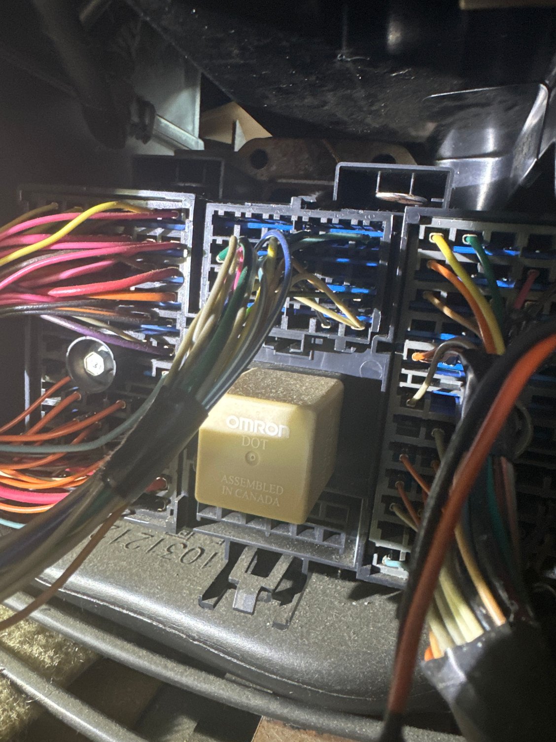 Panel under radio, (driver side)