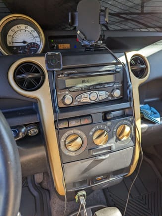 Spray-painted the trim, along with adding a "new" radio/head unit- while it's used and stock, I like this one better, and we'll see if I eventually trade for an aftermarket piece.