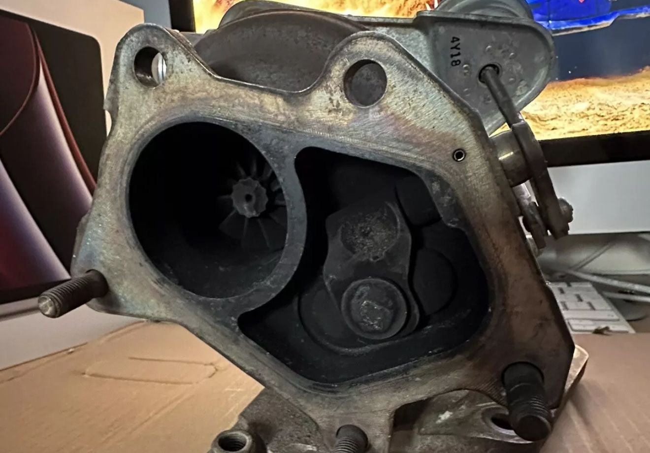 This is what I mean by the backs being different, with the 49 you can actually properly separate each side of the exhaust as apposed to the 35 