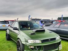 It’s a Impreza gc8 year 2000 was NA swapped for wrx 

It has the big plastic window controls with the enable / disable button at driver side 