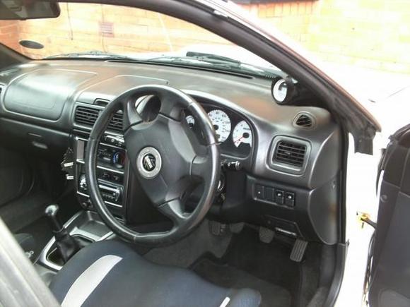 im toying with the idea of putting the red and blake sti trim in to freshen it uo what do u think ?