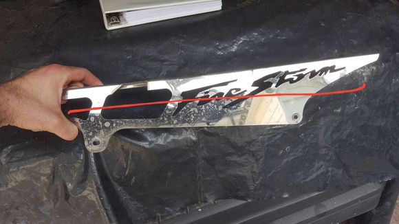 The aftermarket chain guard kept bending and breaking, but along the reline axis...inward toward the tire.
