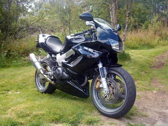 with new yoshimura rs3 stainless cans