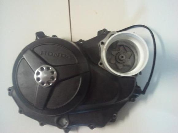 I used a 3" pvc pipe coupler to support the engine cover while pressing out the impeller.