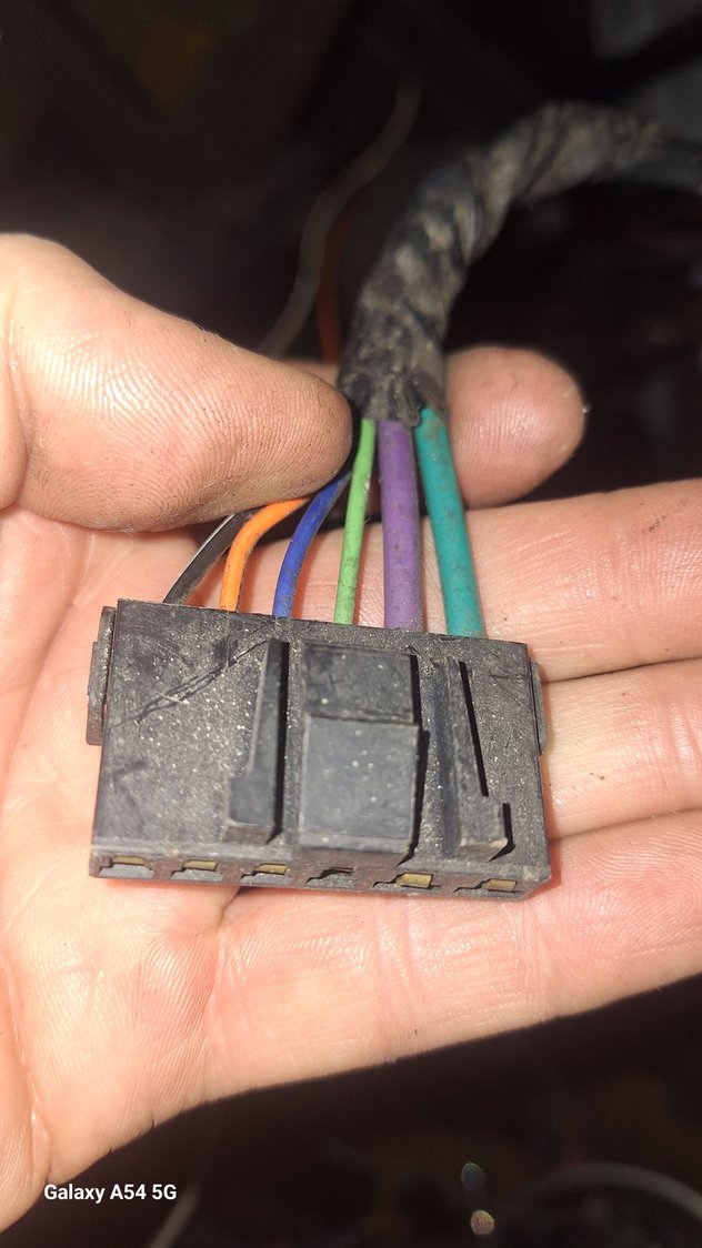 92 rs tbi t5 no power options connector is in the middle of the dash where the console connects. Checked wiring diagrams couldnt find it anyone know what it connects  to traced green wire to neutral saftey switch.