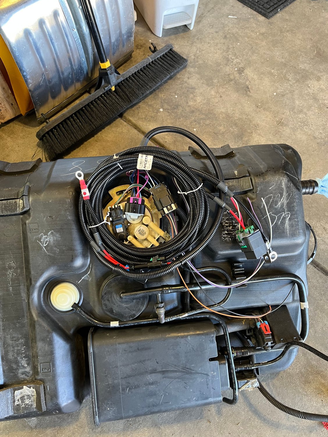 Racetronix fuel pump hot wire kit and tank ready to be installed. 