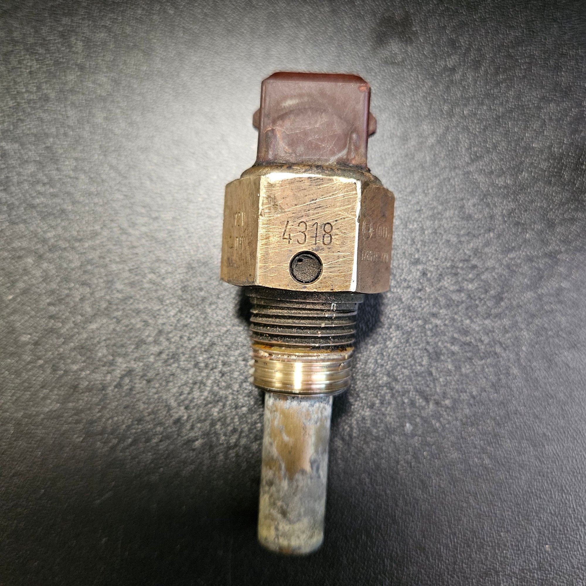 This is the original that came out of my 89 camaro 2.8 v6. Im also needing the smaller radiator fan switch. Any leads where i can find! 