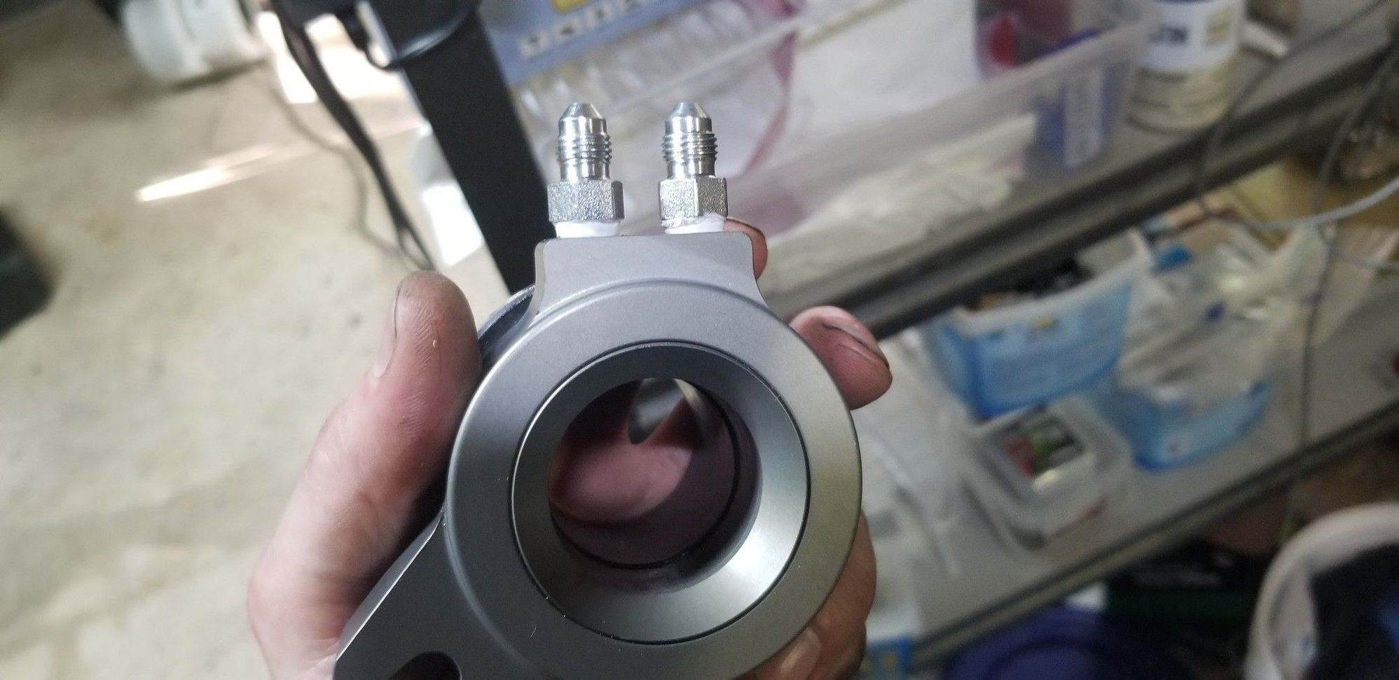 The two fittings which require teflon tape, as per the instructions from RAM.  Why they use NPT for these, I cannot truly say, but it has been 100% leak free since the tape went on.