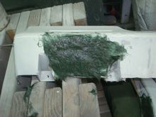 Tiger hair over the repaired fiberglass patch on the front of the driver side ground effect.