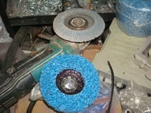 Top disc is the flap disc used for grinding welds, bottom is the new stripping disc.