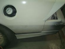 Driver lower ground effect just sitting loose. I still have to strip and epoxy the rear bumper cover plus make repairs on the passenger side.