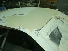 Started sanding out the passenger front corner but left it high until I get the other side rouged in and the mid section of the roof in bondo.