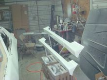 First 2 coats of epoxy on the ground effects and rear spoiler.