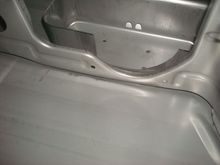 Metal baffling/slosh wall.