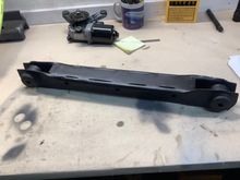 Boxed in lower control arm