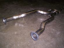 From a collection of 2-1/2" Y-J stainless bends from Vibrant. Then Tigged together with Magnaflow's 2x2-1/2" into 3" merge. It's part of a complete system now from the headers to the tailpipe plus a modified OEM crossmember so it's tucked up as tight as possible. 