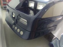 Ait intake and widened front spoiler. Still have to black out the vents
