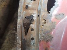 Turned the car around to start on the driver side. There was a hole in the frame under the trans mount so I had to fix that