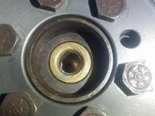 National PB-656-HD pilot bushing.  I have a replacement coming in, thought maybe the marks on the face were from the input shaft.  However, I see no corresponding marks on the shaft.
