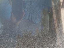Blow the picture up and look at the trillions of "Stars" in my plastic T-tops. They aren't on the outside or inside of the T-top. I think they are between the acrylic plastic and the LexAR™ Coat 100 scratch resistant coating.