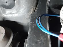 drivers side 
2 things  see split at bottom
at top rubber membrane stopping move toward firewall