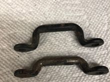 These were on the bench in my garage.  I believe they’re leftovers from my T-top Firebird.   As you can see, one is ‘taller’ than the other.   Not sure if maybe one is a top mount and one is a bottom mount.  It’s been so long I don’t remember.   Maybe someone can chime in and identify them.   
