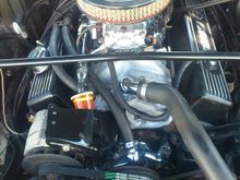 this is not a tall air cleaner and it almost hits my 2" cowl hood.a flat hood would NOT WORK.