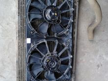 Here are the new fans on an old radiator out of an '89 'Bird. They fit on there with room to spare, so the installation should be a walk in the park, right?