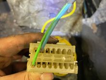 The ECM contact with the blue and green wire coming from the vacuum switch thing and the switch inside the car (see drawing)