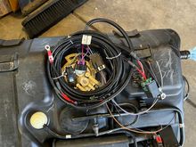 Racetronix fuel pump hot wire kit and tank ready to be installed. 