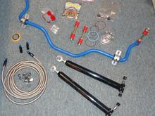 trans filter/gasket, vette servo,poly torque arm bushing,rear sway bar poly links and mounts, braided tranny lines, adj. lower control arms, adj. panhard rod