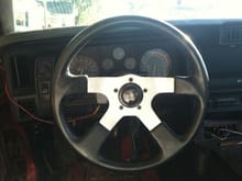 hillbilly wires showing. nice grant steering wheel, 145mph speedo