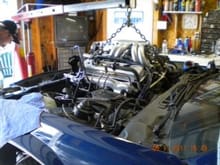 The new engine being put in her new home.