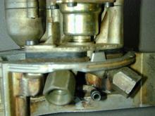 Relief for fuel inlet and return line fittings.