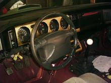 Dash with engine-turned material applied