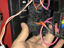 Little panel behind the fuse box