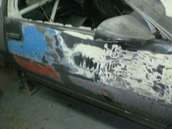 Revealing more of the Morrison Cook livery before stripping the door. White with silver bottom and then the red and blue stripes.